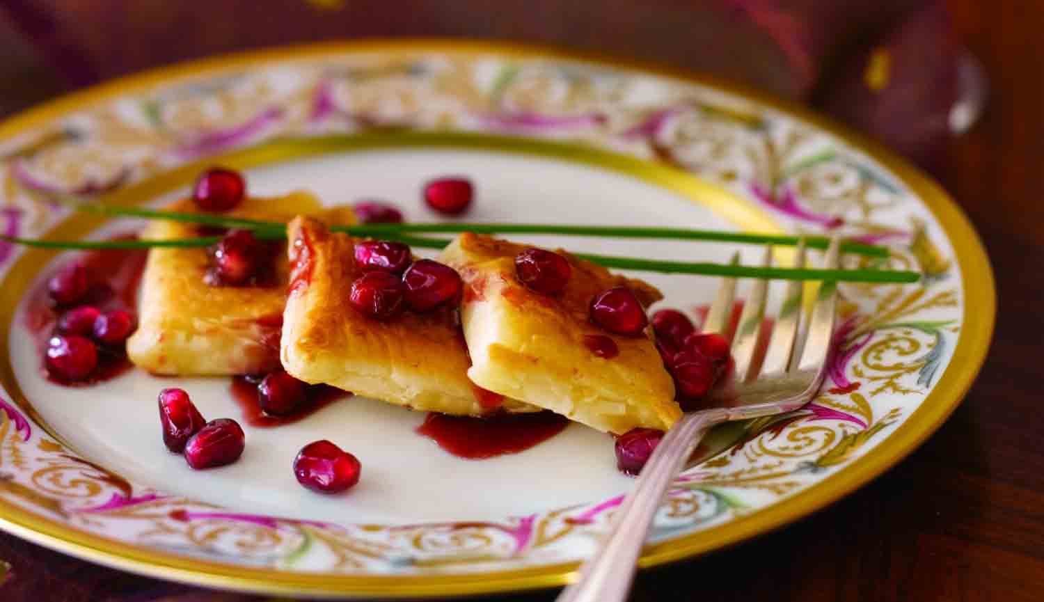 Tom's Toasted Brie with a Pomegranate Raspberry Reduction